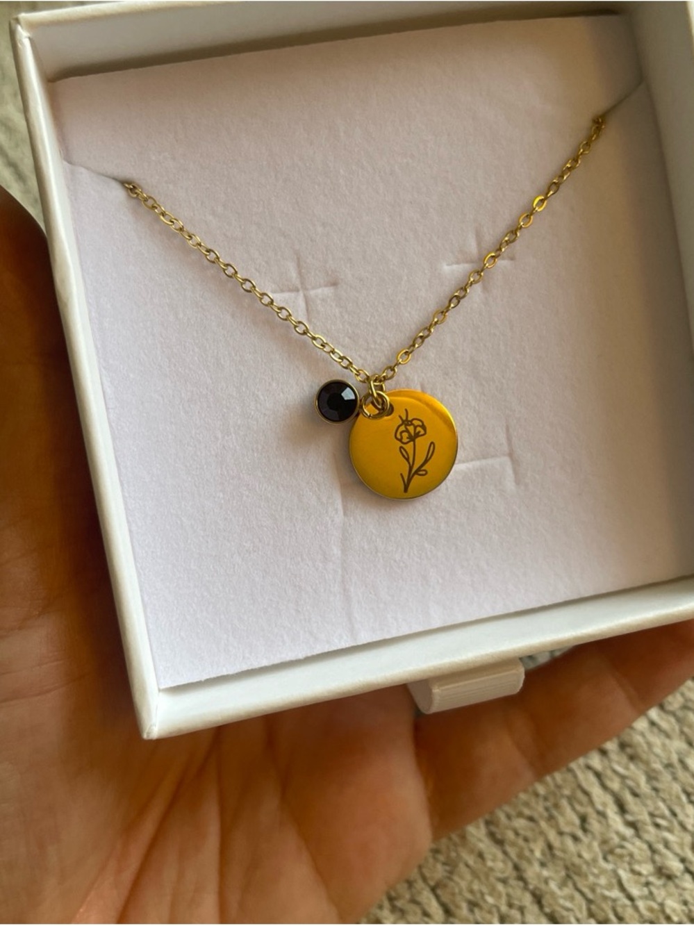 Gold Floral Pendant Necklace with Black Accent